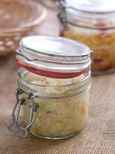 Marinated cabbage (sauerkraut) in glass jar, selective focus