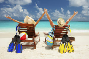 Happy couple on the beach of sea