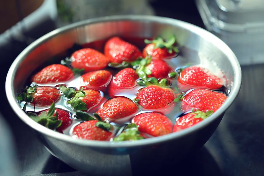 Strawberry red ripe fruit cleaning water prepare food cooking in stainless bowl kitchen wares